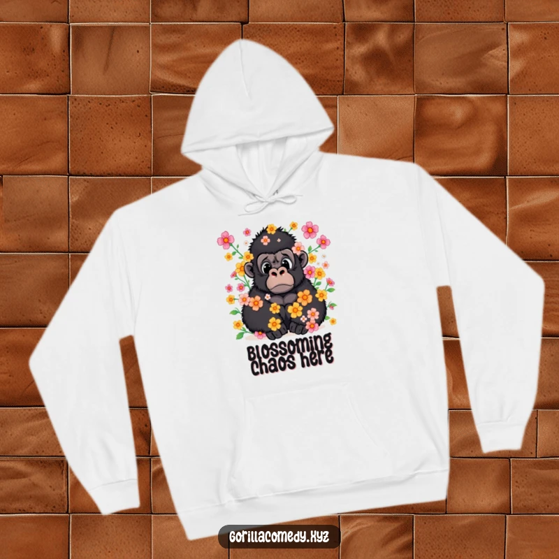 Funny hoodie depicting a surprised gorilla immersed in a soft shower of colorful petals.