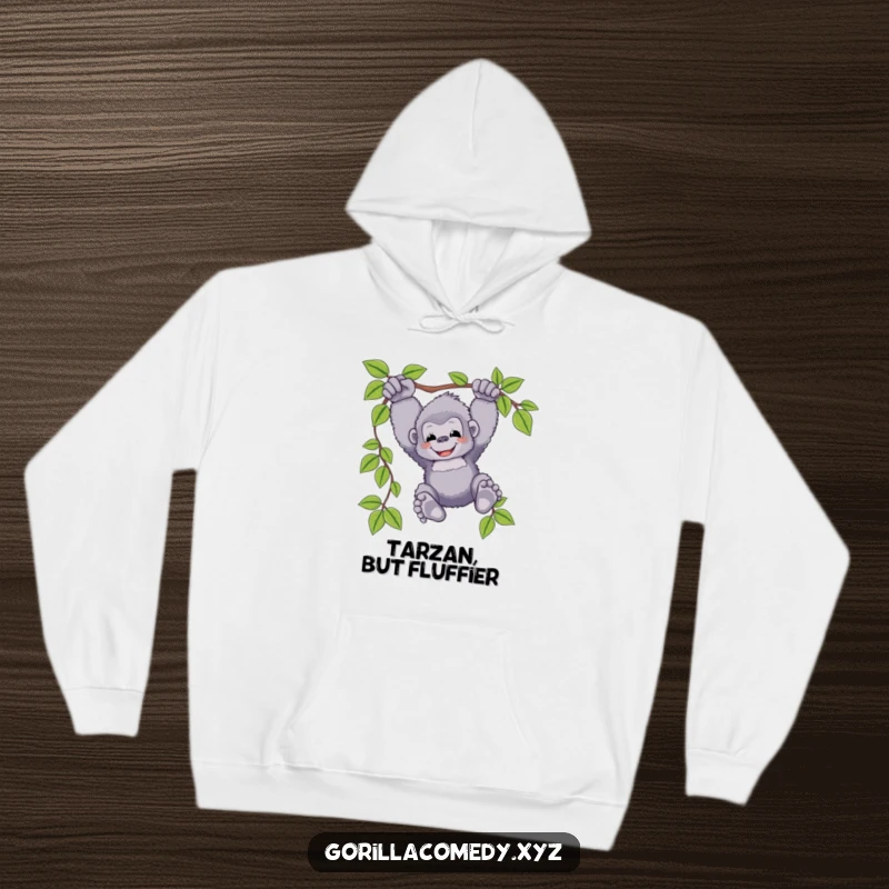 Funny gorilla hoodie featuring a fluffy ape character happily swinging on a vine, its feet dangling, providing warmth and humorous comfort.