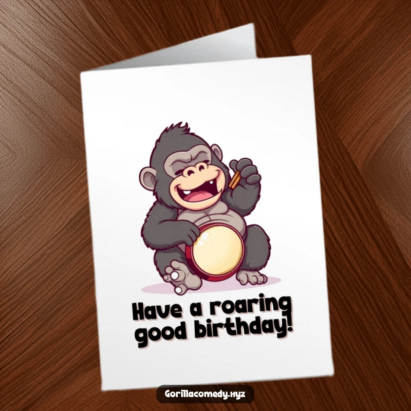 Funny Free Printable birthday card: a cartoon gorilla comically attempts a clumsy drum solo by beating on its own belly.