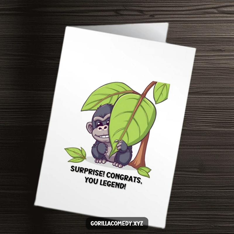 Free Printable Congrats Card featuring a mischievous gorilla peeking out from behind a large leaf with a chuckle, celebrating a win.