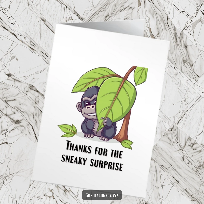 Funny Free Printable Thank You Card: a mischievous gorilla hides behind a leaf, peeking out with a chuckle to say thanks.