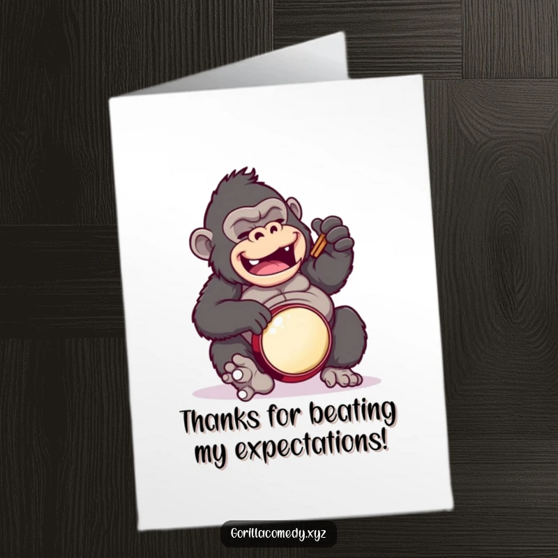 Funny Free Printable thank you card: a gorilla character humorously plays a clumsy drum solo on its belly, expressing thanks.