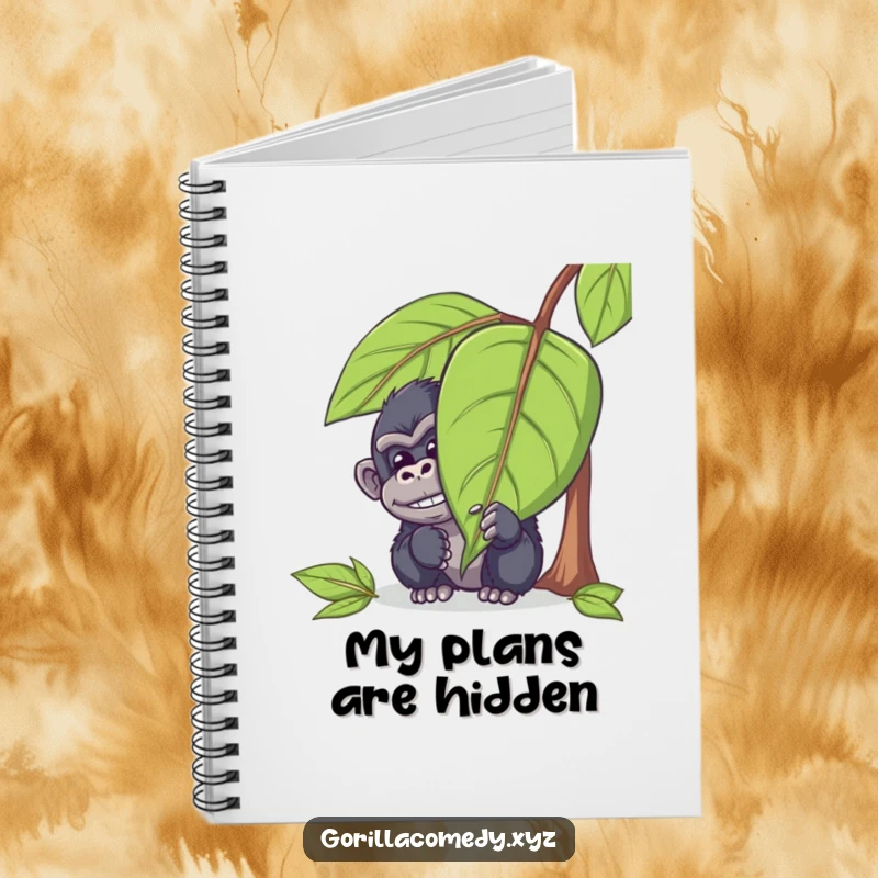 Funny gorilla notebook with a mischievous ape character hiding behind a leaf, peeking out with a chuckle, ideal for journaling, sketching, or jotting funny thoughts.