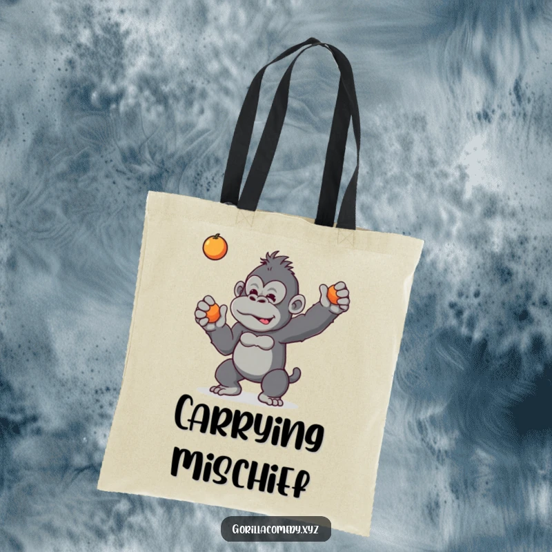 Funny tote bag featuring a mischievous gorilla playfully tossing a small fruit, embodying jungle antics and fun.