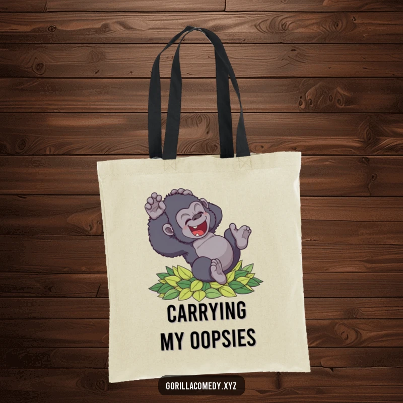 Funny clumsy gorilla tote bag tumbling with delight into soft leaves, perfect for carrying essentials with a smile, a fun gift.